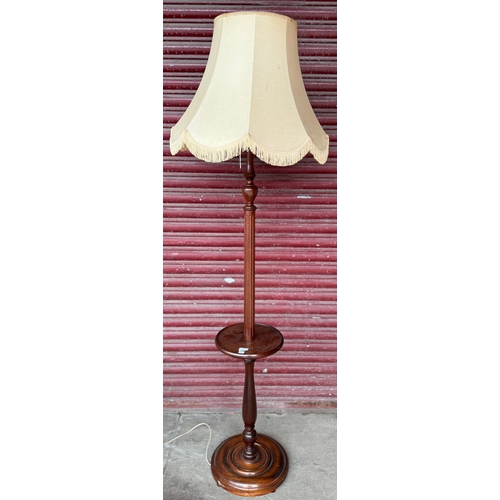 252 - A mahogany standard lamp