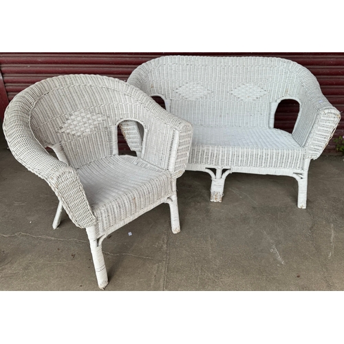 253 - A Lloyd Loom style white painted wicker armchair and settee