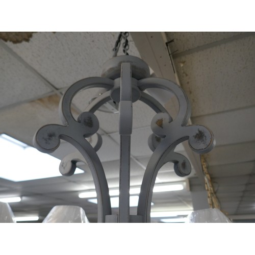 1487 - A Coachhouse six arm grey chandelier