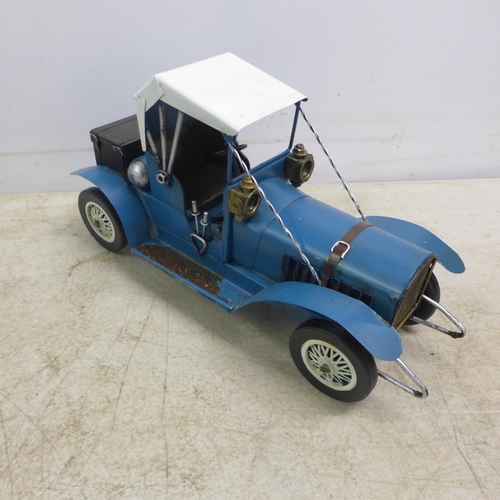 2093 - A collection of various tin plate model cars and motorbikes