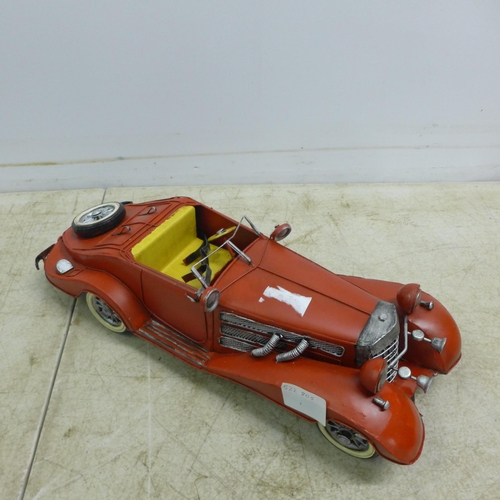 2093 - A collection of various tin plate model cars and motorbikes