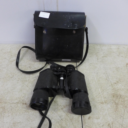 2100 - A pair of Mark Scheffel 3 degree field 20 x 50 binoculars in leather case