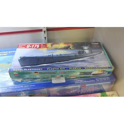 2102 - A quantity of AirFix and other model kits including a 1:400 U-176 battle ship, 1/72 scale model of a... 