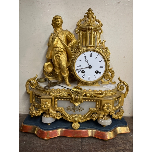 376 - A 19th Century French gilt metal and alabaster mantle clock