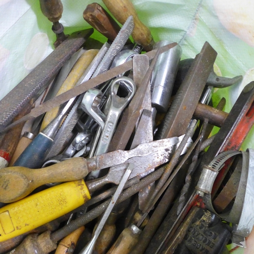 2059 - A large quantity of assorted hand tools including files, planes, chisels, spanners, a hand drill, wi... 