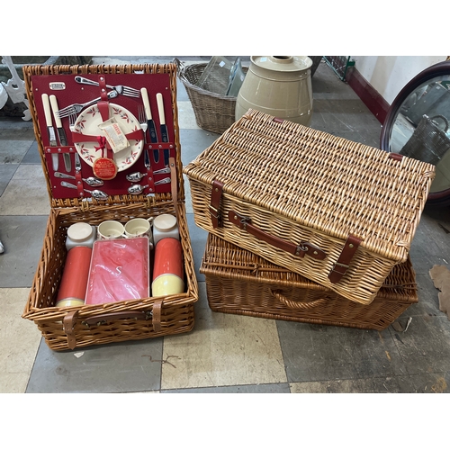 391 - A Sirram picnic set and two wicker baskets