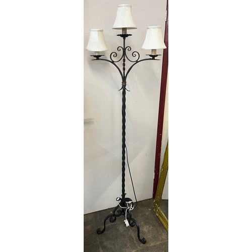 394 - A French style wrought iron standard lamp