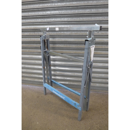 2184 - Three metal Silverline builders trestle stands