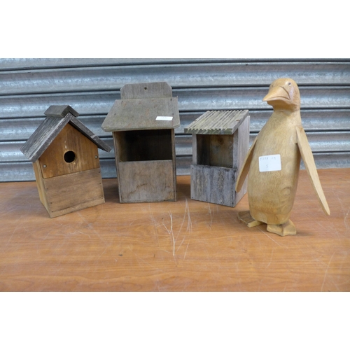 2192 - 3 bird boxes, two supports and a wooden penguin ornament