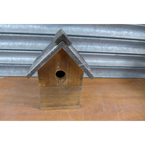 2192 - 3 bird boxes, two supports and a wooden penguin ornament