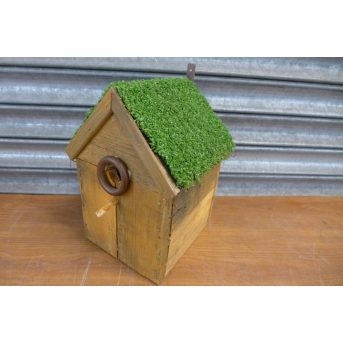 2193 - A wooden hanging bird house and 2 wooden nest boxes