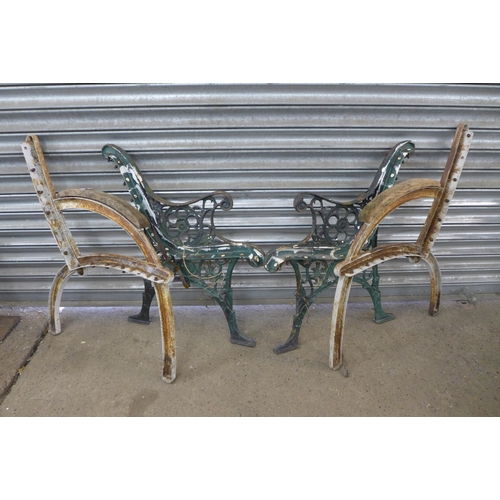 2204 - Two pairs of cast iron bench ends