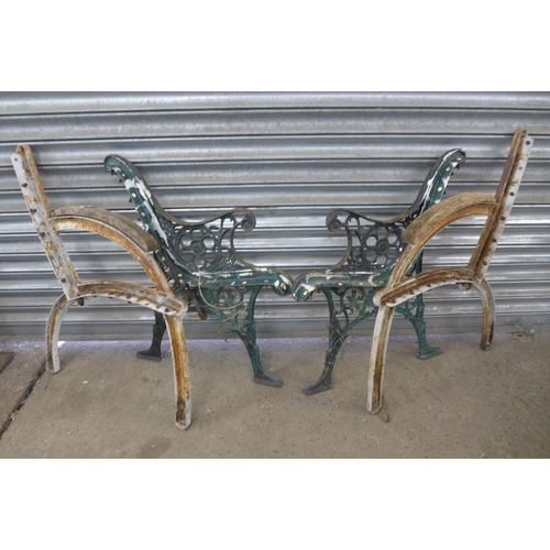 2204 - Two pairs of cast iron bench ends