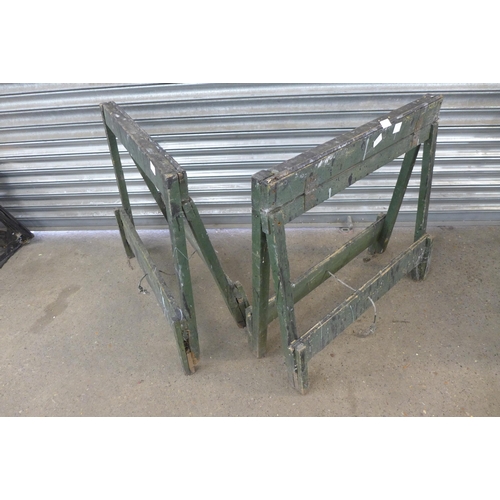 2213 - A pair of wooden folding trestle stands and a Black & Decker Workmate folding work bench