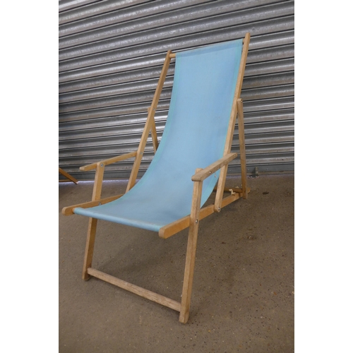 2225 - 2 folding blue canvas wooden deckchairs