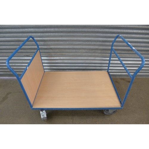 2237 - A 4 wheel flat bed trolley by Slingby - 124 x 81cm