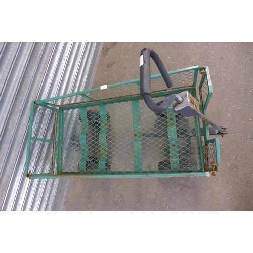 2246 - A 4 wheeled metal gardening trolley