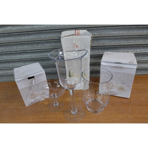 2259 - A large glass candle holder, small glass candle holder and a 25cm decorative glass jar