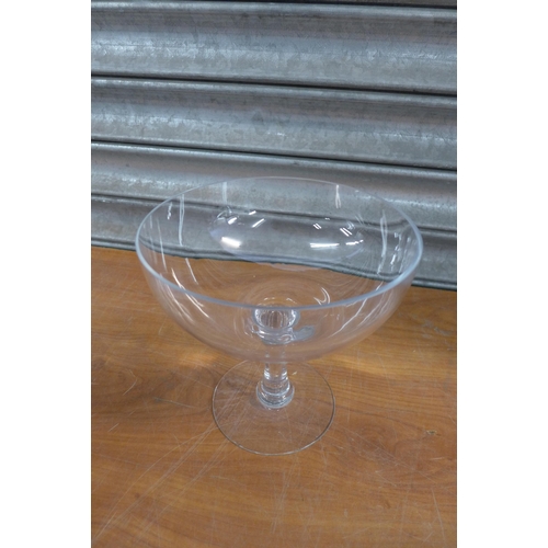 2259 - A large glass candle holder, small glass candle holder and a 25cm decorative glass jar