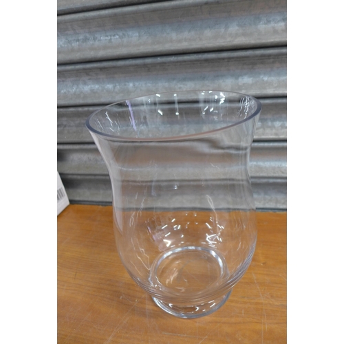 2259 - A large glass candle holder, small glass candle holder and a 25cm decorative glass jar