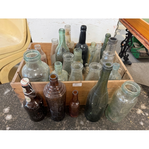 307 - Assorted vintage glass bottles