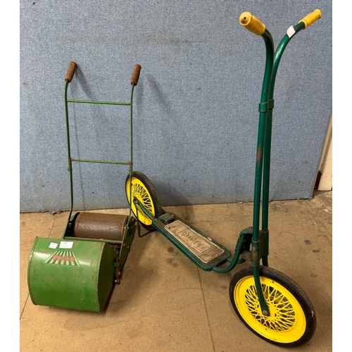 308 - A Tri-ang child's scooter and a Webb child's toy lawnmower