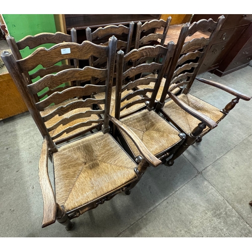 267 - A set of six 18th Century style oak rush seated ladderback chairs