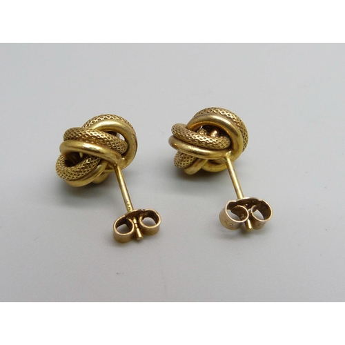 1011 - A pair of 9ct gold knot earrings, 1.94g