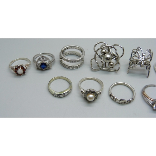 1026 - Eleven silver rings, 38.6g