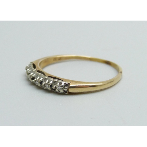 1034 - An 18ct gold ring set with six diamonds, 1.6g, N