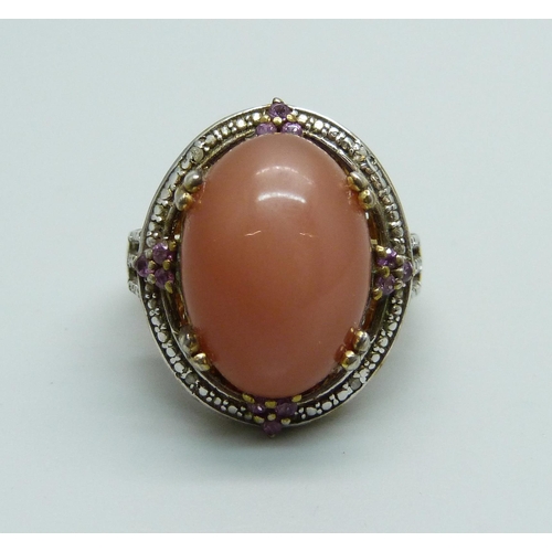 1044 - A silver gilt, peach moonstone and diamond ring, Q