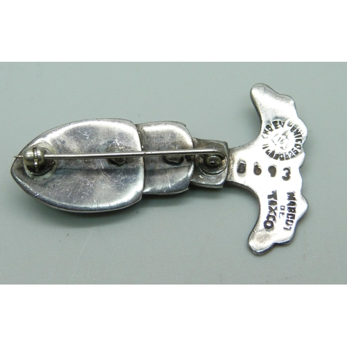 1047 - A sterling silver Mexican Taxco fish brooch with enamelled decoration and articulated body, circa 19... 