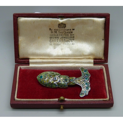 1047 - A sterling silver Mexican Taxco fish brooch with enamelled decoration and articulated body, circa 19... 