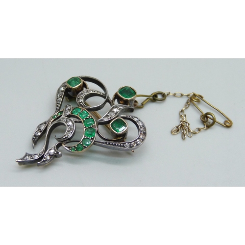 1051 - A yellow metal brooch set with diamonds and emeralds, possibly converted, 6.1g, 28mm x 36mm