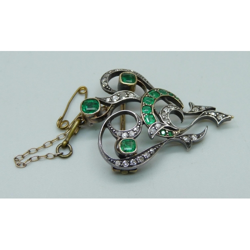 1051 - A yellow metal brooch set with diamonds and emeralds, possibly converted, 6.1g, 28mm x 36mm