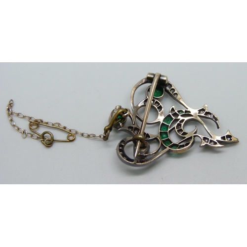 1051 - A yellow metal brooch set with diamonds and emeralds, possibly converted, 6.1g, 28mm x 36mm