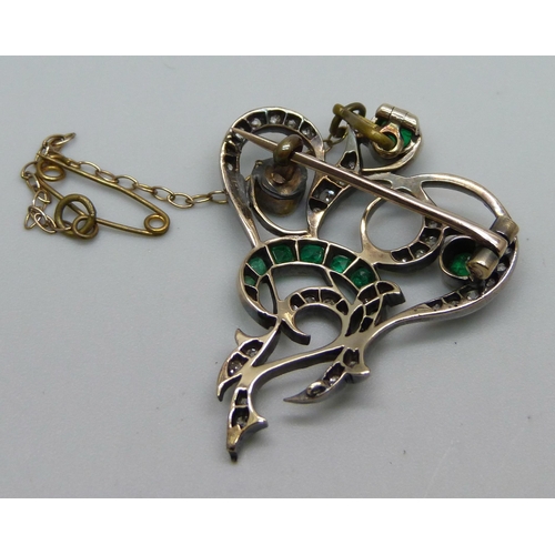 1051 - A yellow metal brooch set with diamonds and emeralds, possibly converted, 6.1g, 28mm x 36mm