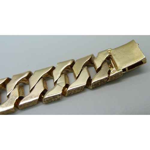 1058 - A heavy 9ct gold curb linked ID bracelet with bark effect texture, set with 3.4ct of diamonds, round... 