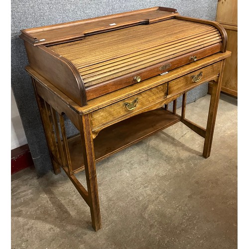 122 - An Edward VII mahogany tambour roll top clerks desk