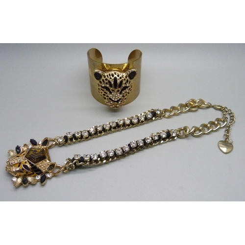 1061 - A Betty Jackson lion necklace and panther bracelet