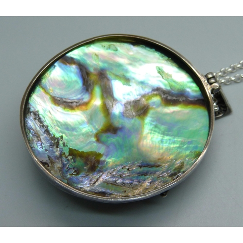 1062 - A silver mounted abalone pendant and chain