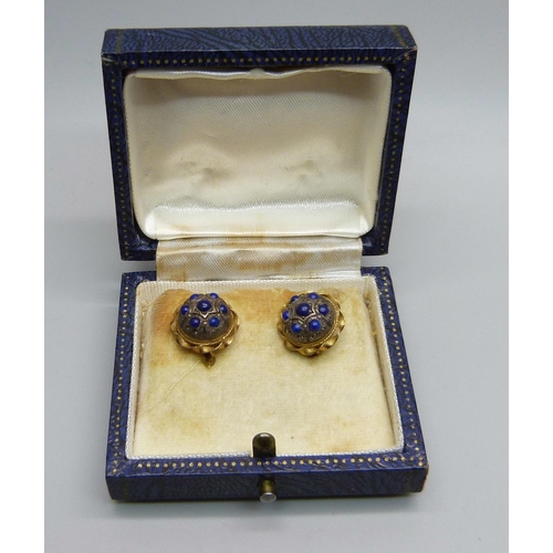 1067 - A pair of 18ct gold earrings set with lapis lazuli, 4.8g