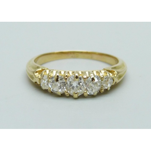 1069 - A yellow metal and five stone diamond ring, approximately 1ct total diamond weight, 3.7g, N