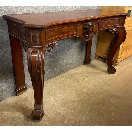 124 - An early Victorian carved mahogany serving table