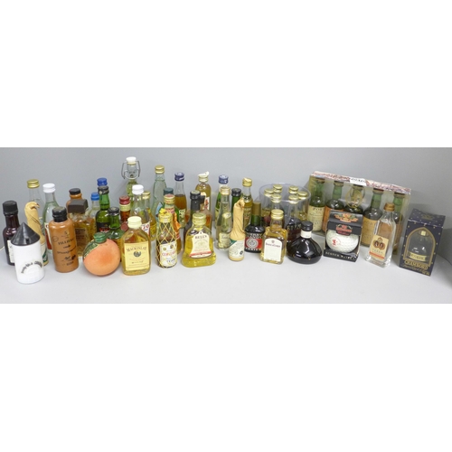 1154 - A collection of alcohol miniatures including a set of Porto wine 1994 **PLEASE NOTE THIS LOT IS NOT ... 