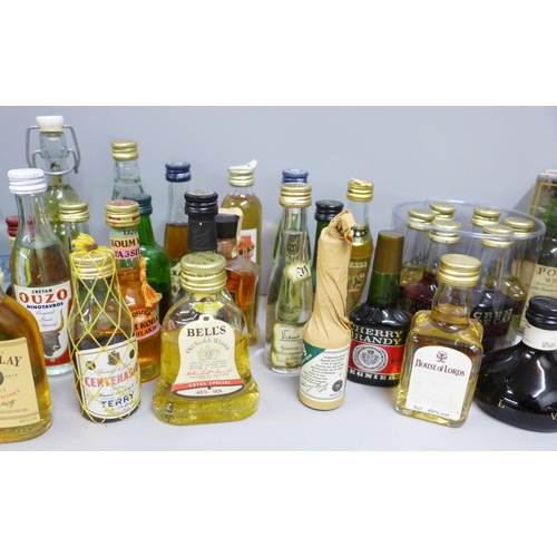 1154 - A collection of alcohol miniatures including a set of Porto wine 1994 **PLEASE NOTE THIS LOT IS NOT ... 