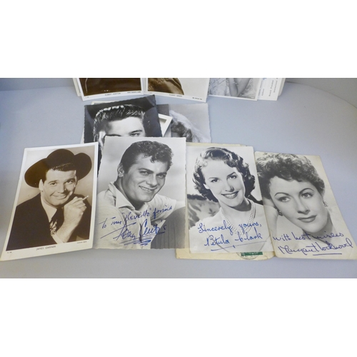 617 - A tin containing celebrity photographs and postcards, many with facsimile autographs including Dirk ... 