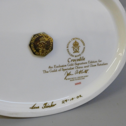 628 - A Royal Crown Derby crocodile paperweight, exclusive gold signature edition for The Guild of Special... 