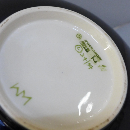 633 - A Moorcroft Anemone pottery fruit bowl, 26.5cm