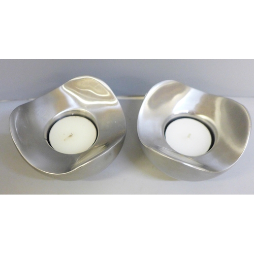 634 - A pair of Georg Jensen candle holders